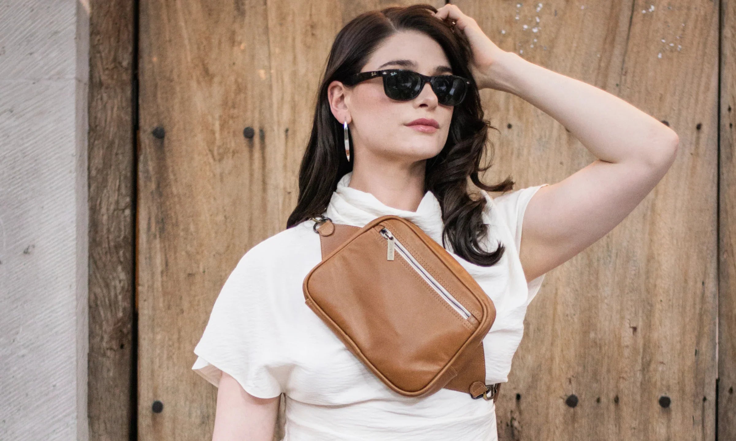 Sofia wearing the Sofia x Zendira concealed carry crossbody bagāstylish gun purse for women designed for discreet protection.