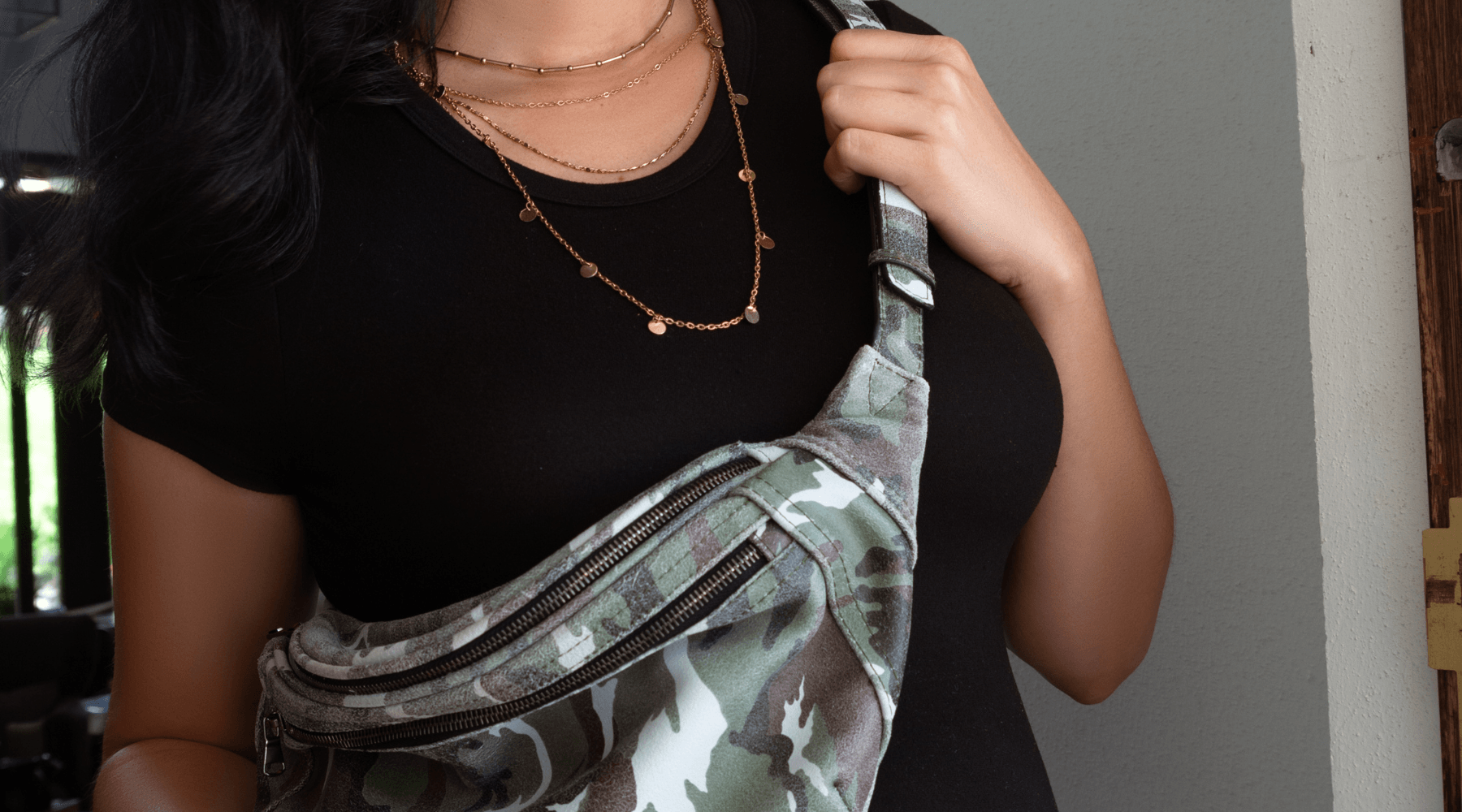Woman carrying a ROSE by Sig Sauer in her Zendira Camo Friday Concealed Carry Belt Bag