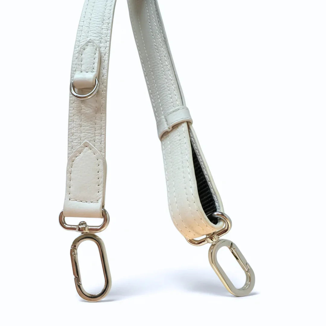 Embroidered cherry blossoms on the Zendira Saturday concealed carry bag in dove.