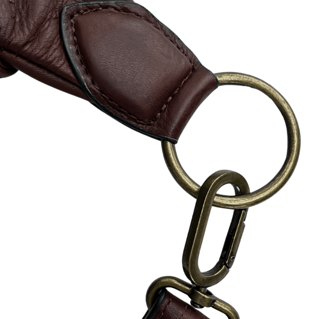 Leather strap and hardware detail on the Zendira Saturday concealed carry crossbody