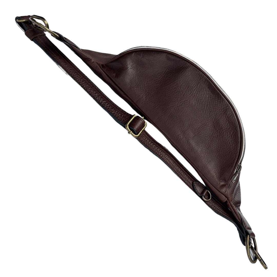 Top view of the Zendira Saturday leather crossbody bag in Coco Creme