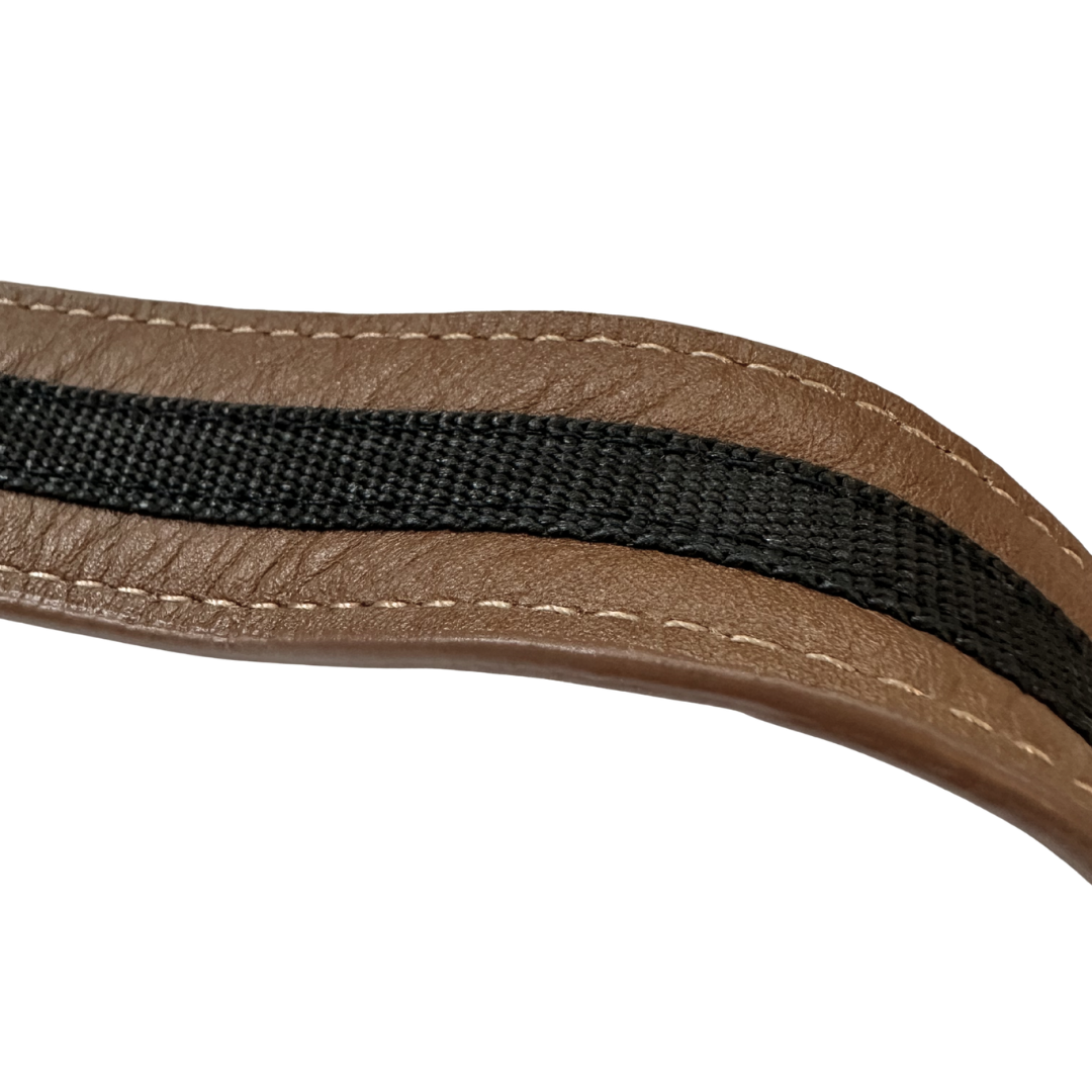 Cut-resistant strap of the Cafe Con Leche Zendira Saturday concealed carry crossbody bag with antique bronze hardware and smooth, soft neutral brown leather.