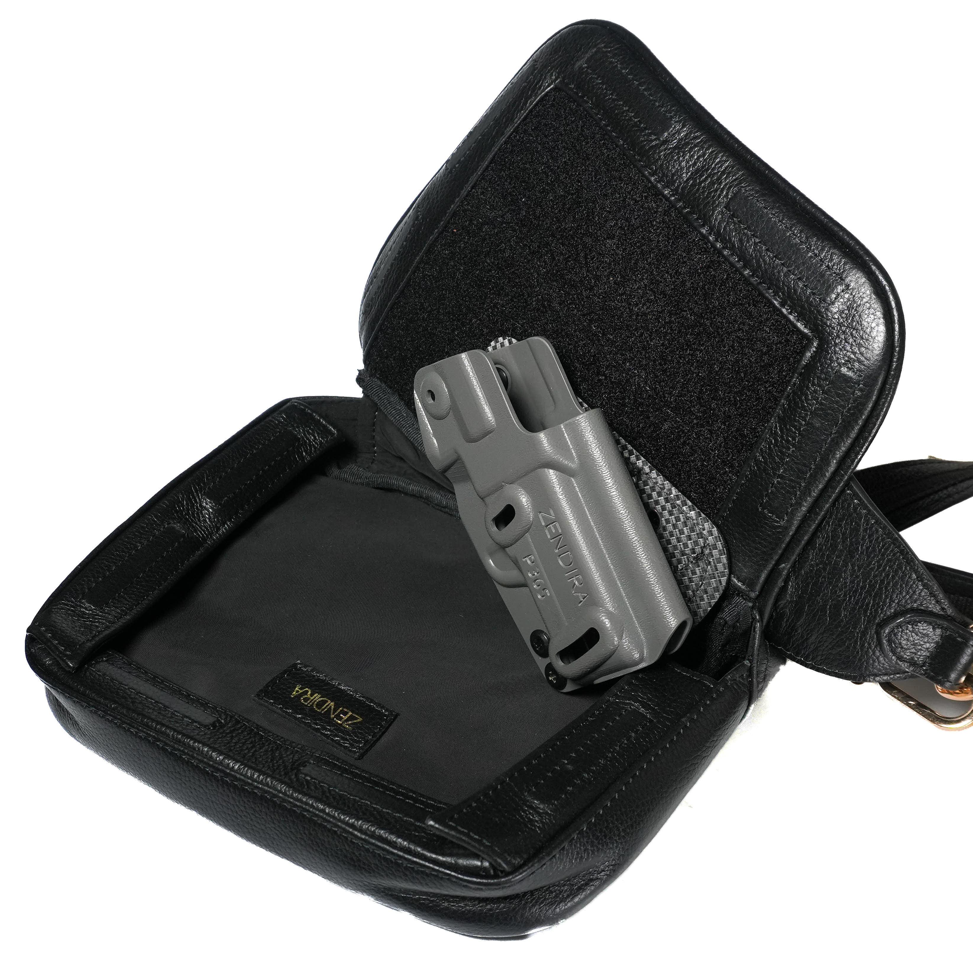 Close-up of magnetic closure on Zendira Sofia concealed carry bag in stiletto black leather