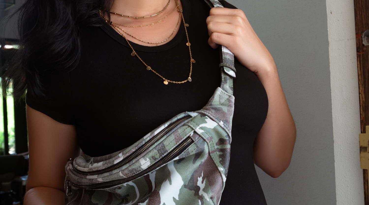 Woman carrying a ROSE by Sig Sauer in her Zendira Camo Friday Concealed Carry Belt Bag 