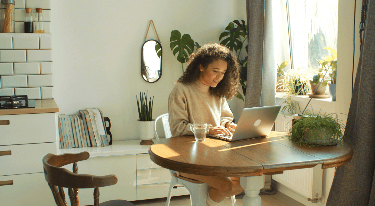 Woman reading blogs for women handgun owners in her home.