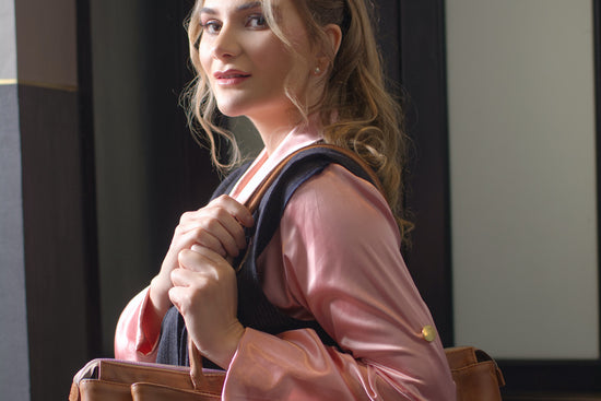Designer concealed carry purse (concealed carry handbag) with a model.