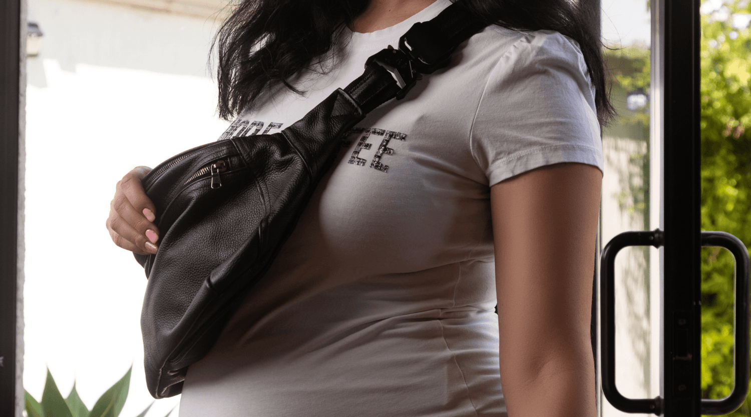 Woman with a Zendira Concealed Carry Belt Bag going to the AGAG National Conference