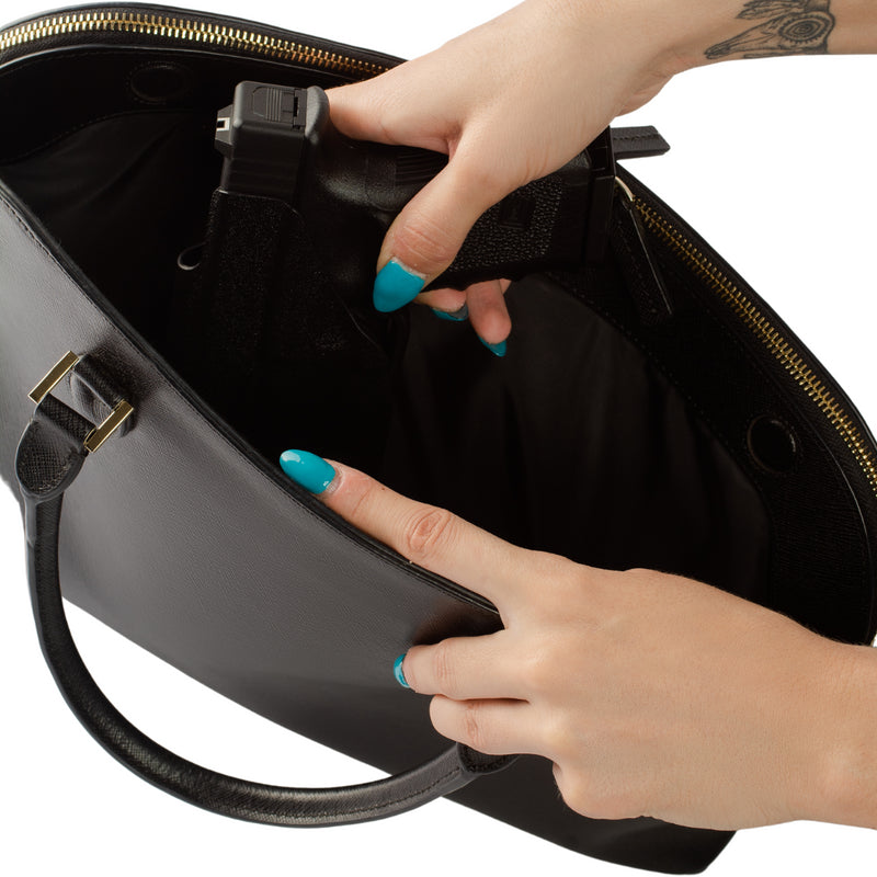 The Zendira Monday Concealed Carry Laptop Bag with dedicated concealed carry compartment with magnet access.