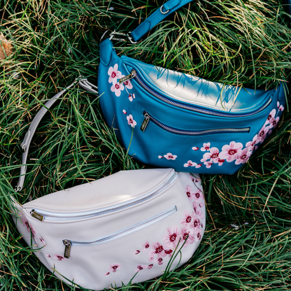 Embroidered cherry blossoms on the Zendira Saturday concealed carry bag outside.