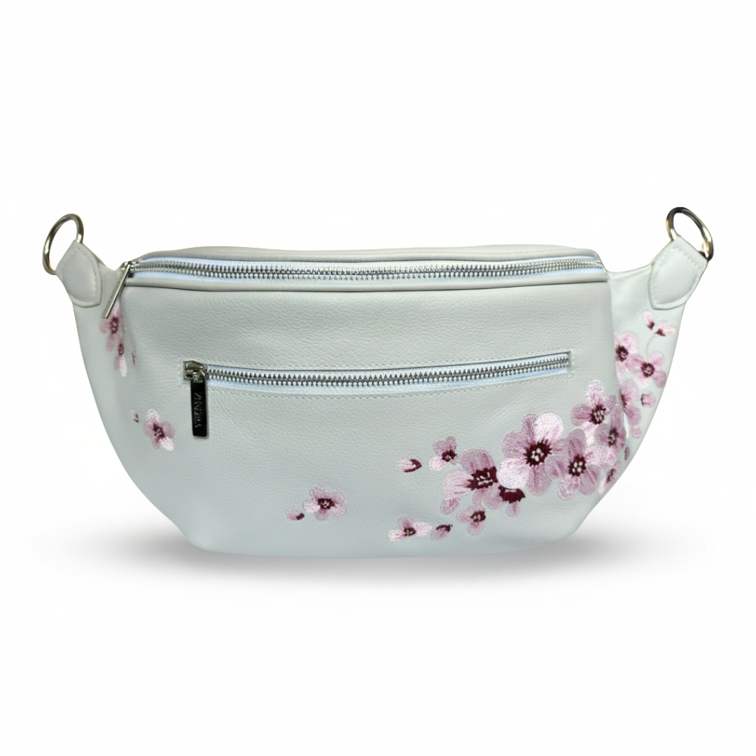 Embroidered cherry blossoms on the Zendira Saturday concealed carry bag in dove.