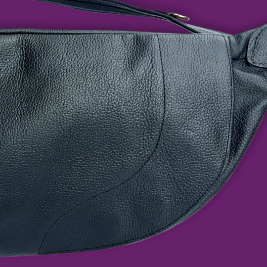 Zendira pebbled leather over the magnetic firearm compartment opening