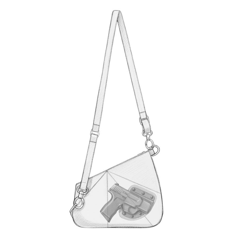 Zendira Origami bag with a holstered firearm inside the dedicated magnetic-access compartment.