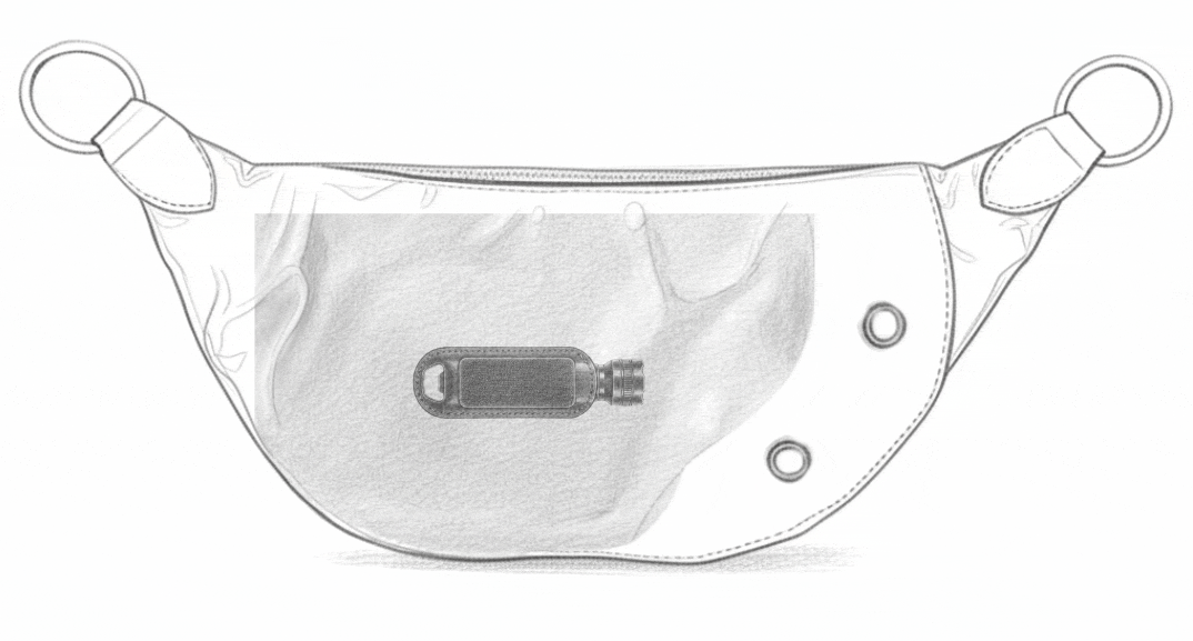 Zendira Saturday bag sketch with a passport, firearm, keys, phone, sunglasses, and spare magazine in the dedicated firearm compartment.