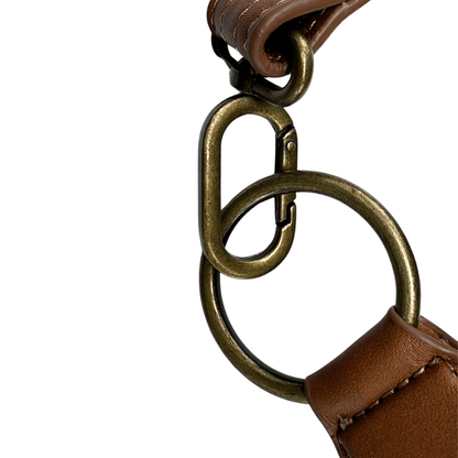 Antique bronze hardware detail on the Zendira Saturday concealed carry crossbody in Cafe Con Leche