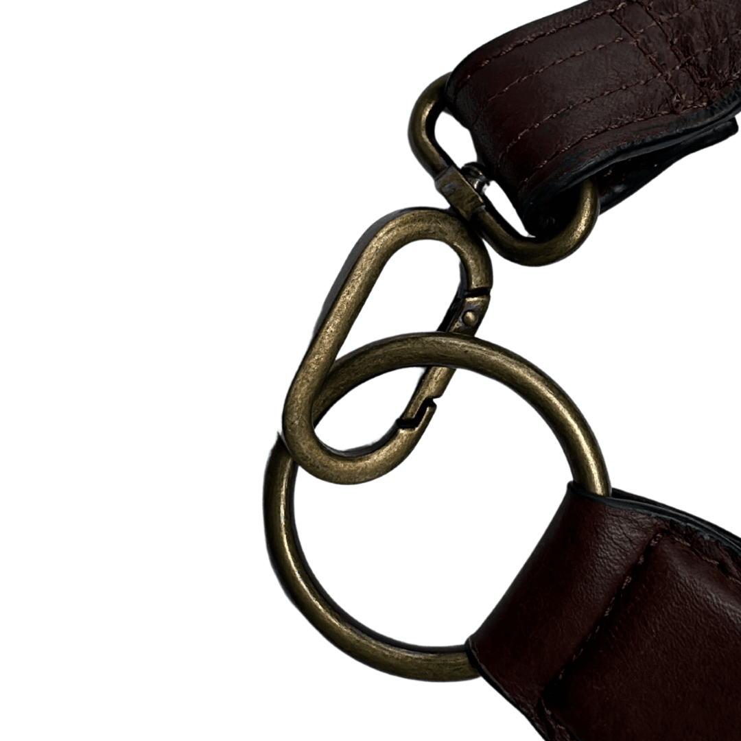 Leather strap and hardware detail on the Zendira Saturday concealed carry crossbody