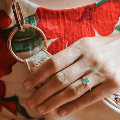 Close up view of the Zendira Saturday Pearl leather crossbody bag with gold hardware
