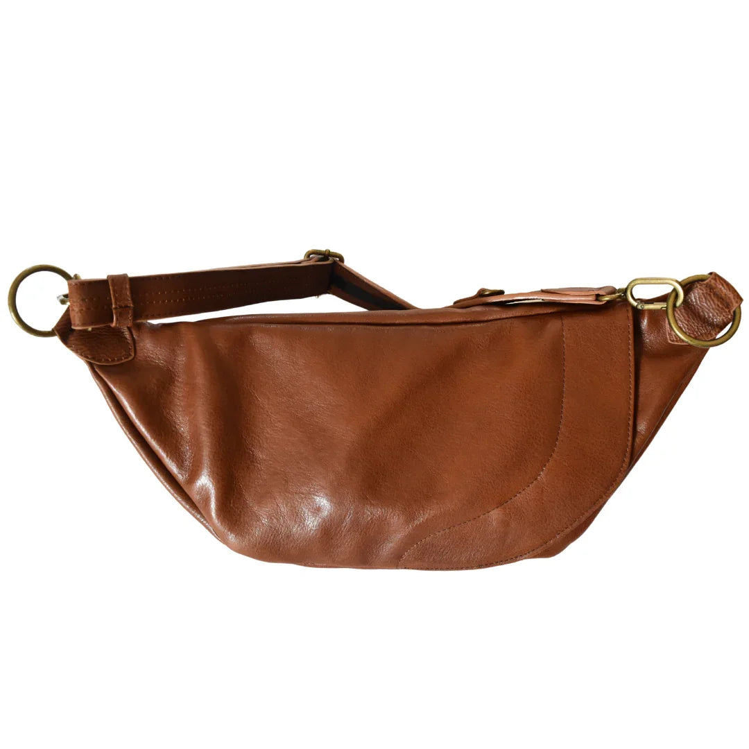 The back of a Zendira Saturday concealed carry crossbody in Toffee leather