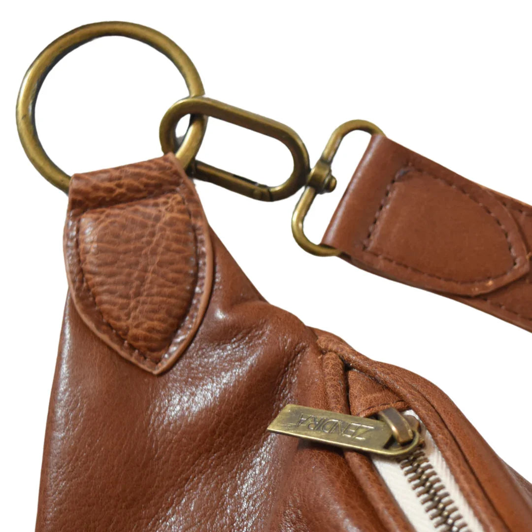 Close up view of the Zendira Saturday concealed carry crossbody bag in toffee