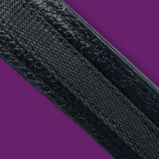 Zendira cut resistant strap for the Saturday concealed carry bag on purple background.