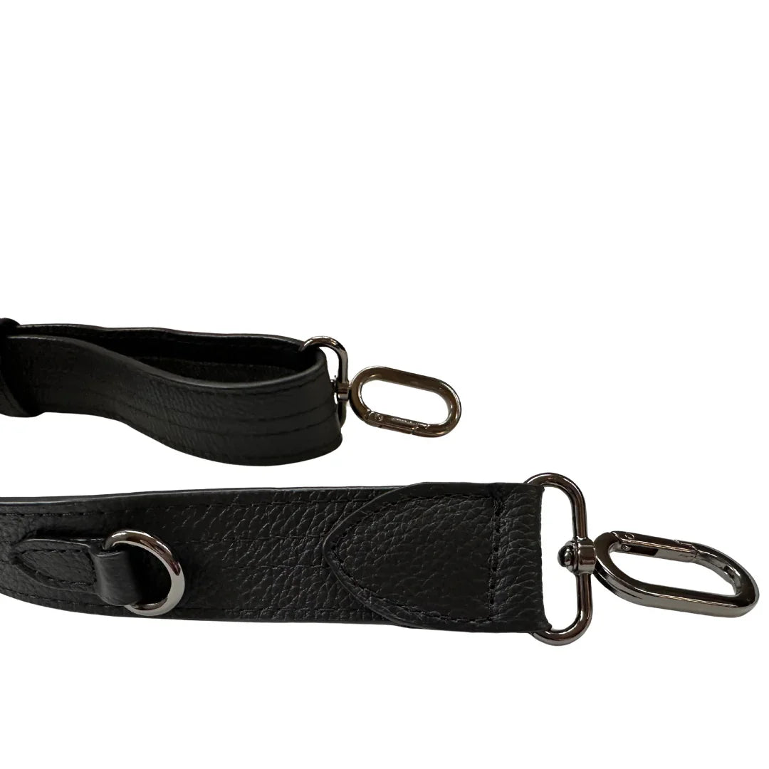 Strap hardware in gun metal and pebbled black leather for the Zendira Saturday concealed carry crossbody bag in Cookies and Cream.