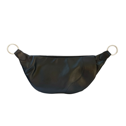 Product image showing how the magnetic opening of the Stiletto Zendira Saturday concealed carry crossbody bag works.