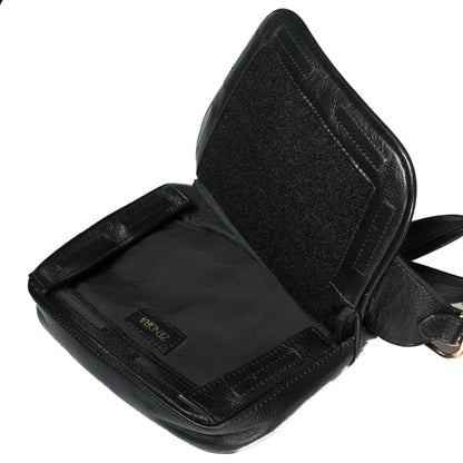 Close-up of magnetic closure on Zendira Sofia concealed carry bag in stiletto black leather