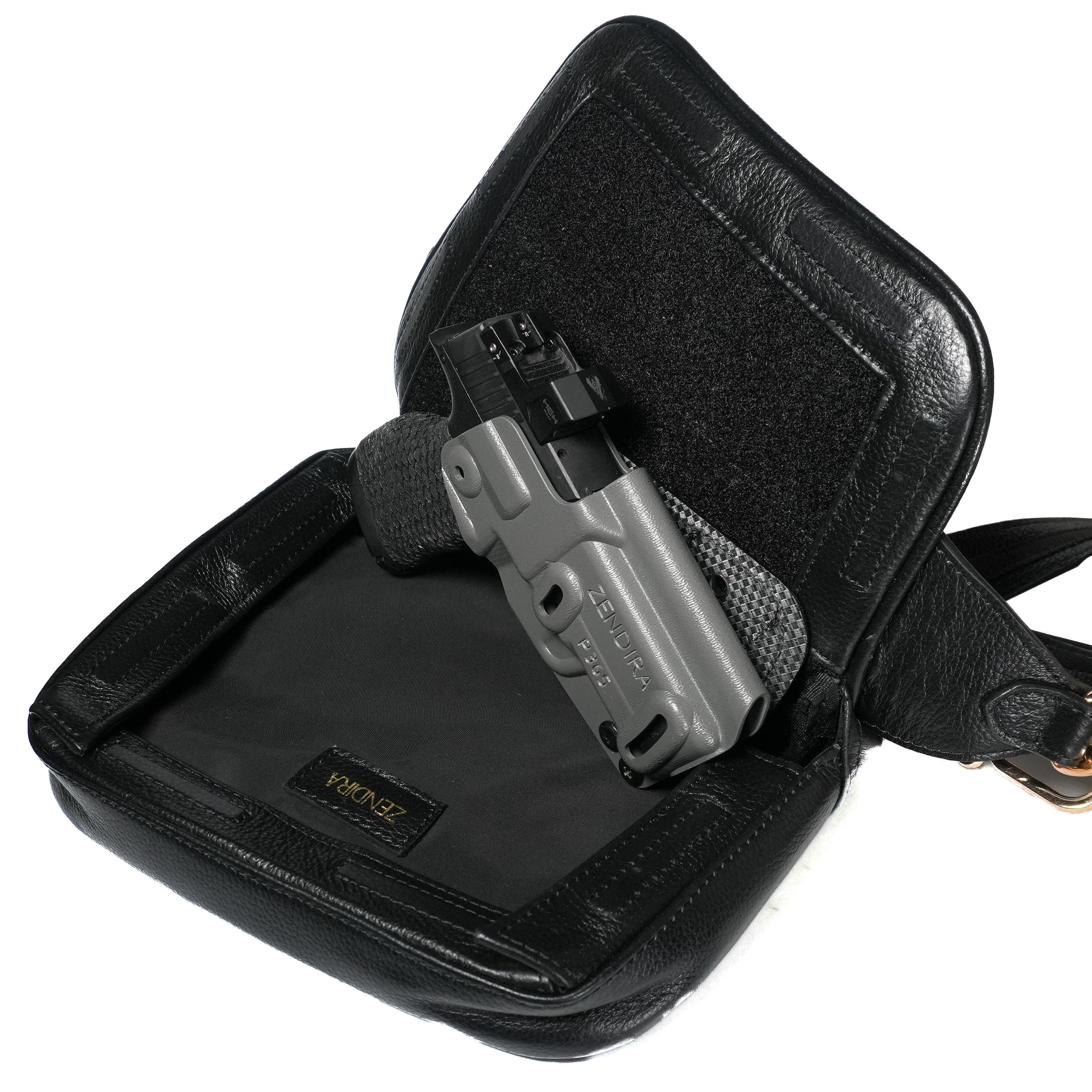 Interior view of Zendira Sofia concealed carry bag in stiletto leather showing dedicated firearm compartment