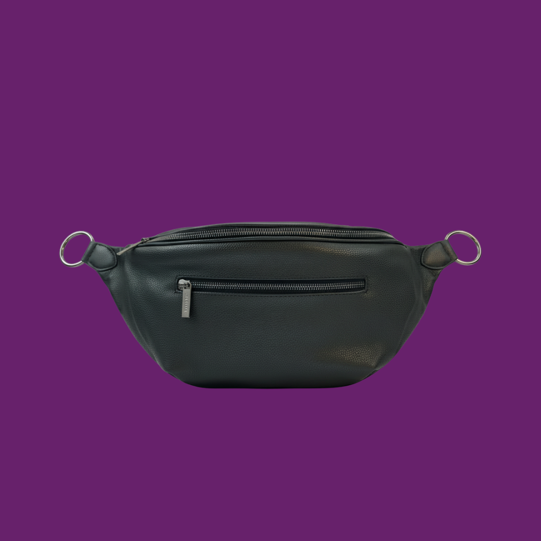 Zendira Saturday bag in Smoke to show the top quality leather and materials on a purple background.